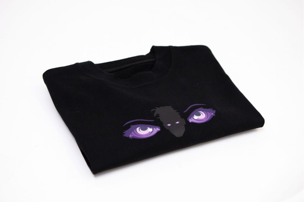 T-shirt oversize noir en coton bio porté par un homme - We Got Pain
