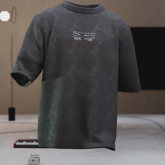 T-shirt oversize noir en coton bio porté par un homme - We Got Pain